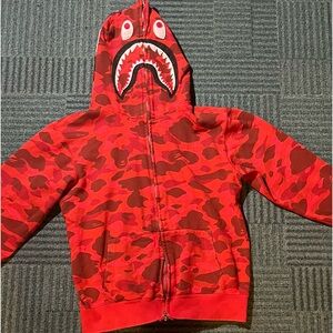 Gently used red Bape hoodie, full zip camo will negotiate prices and offers